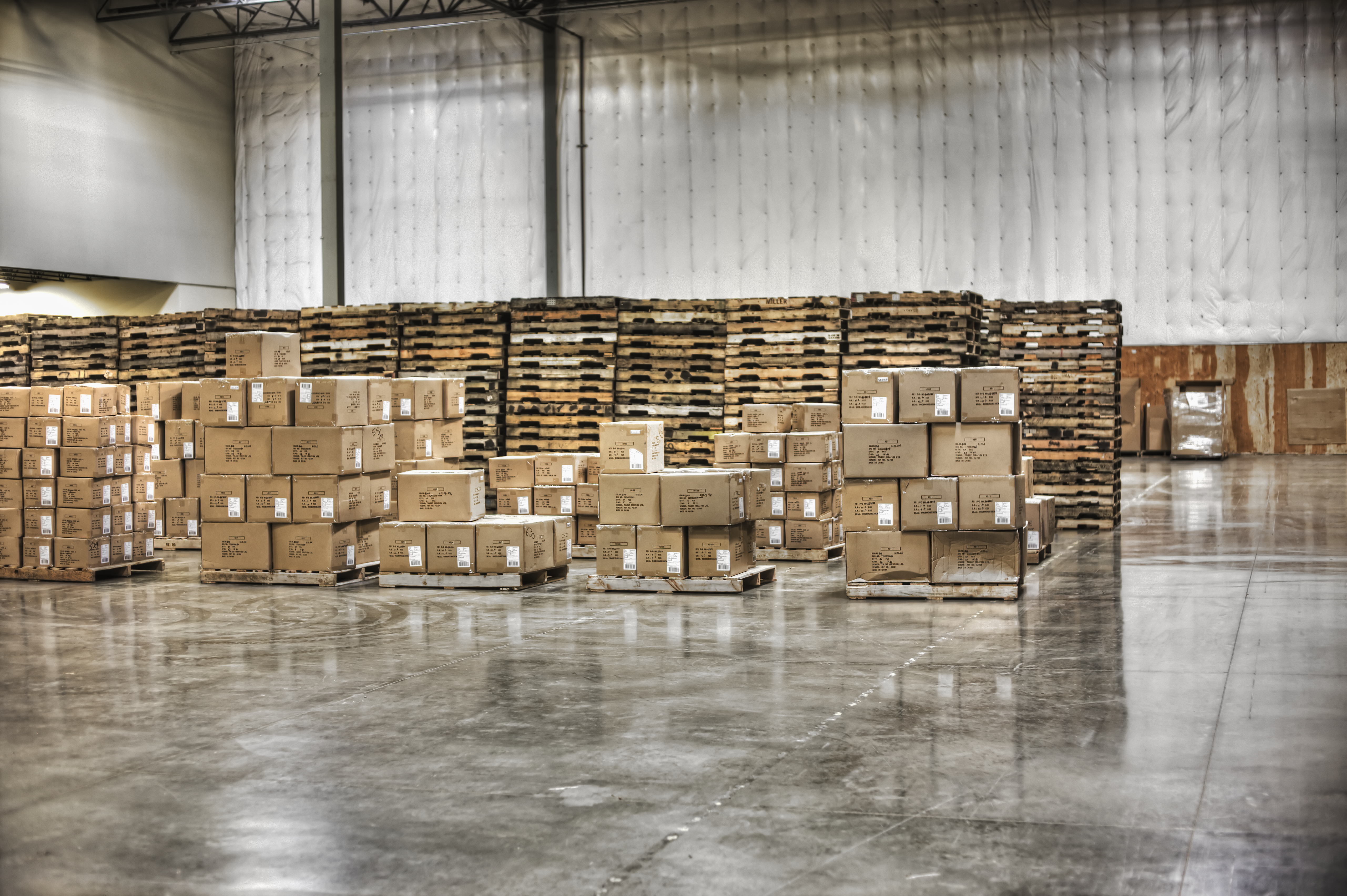 Cardboard boxes and pallets in warehouse